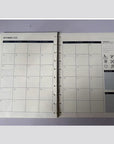 Printed sample of the 2027/2028 monthly calendar refill – open spread, close view