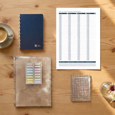 The Starter Kit contents — notebook, weekly calendar, index dividers and clear pockets
